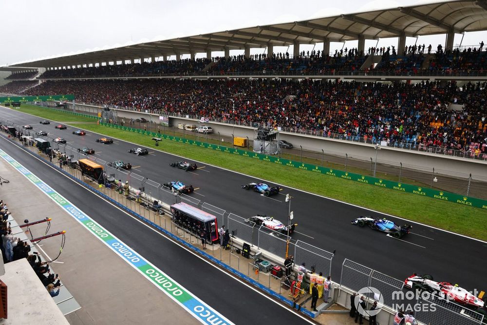 The drivers pull away for the start of the race